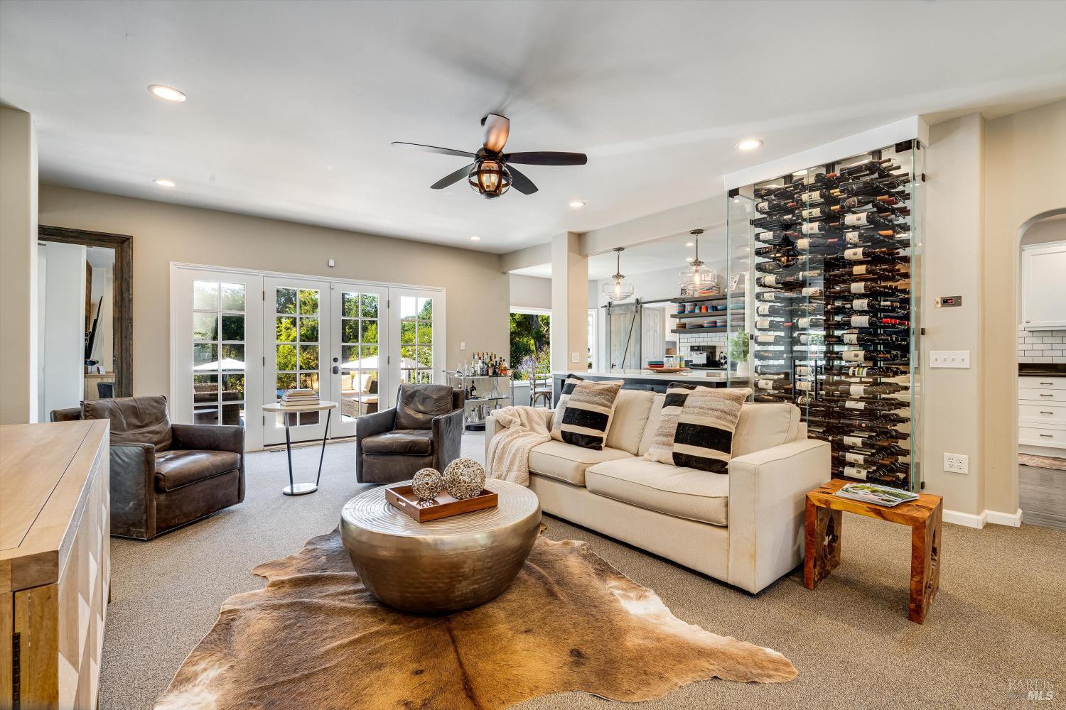 2980 Warm Springs Road Glen Ellen, CA 95442 - Photo 12 of 59 a living room with furniture and a large window