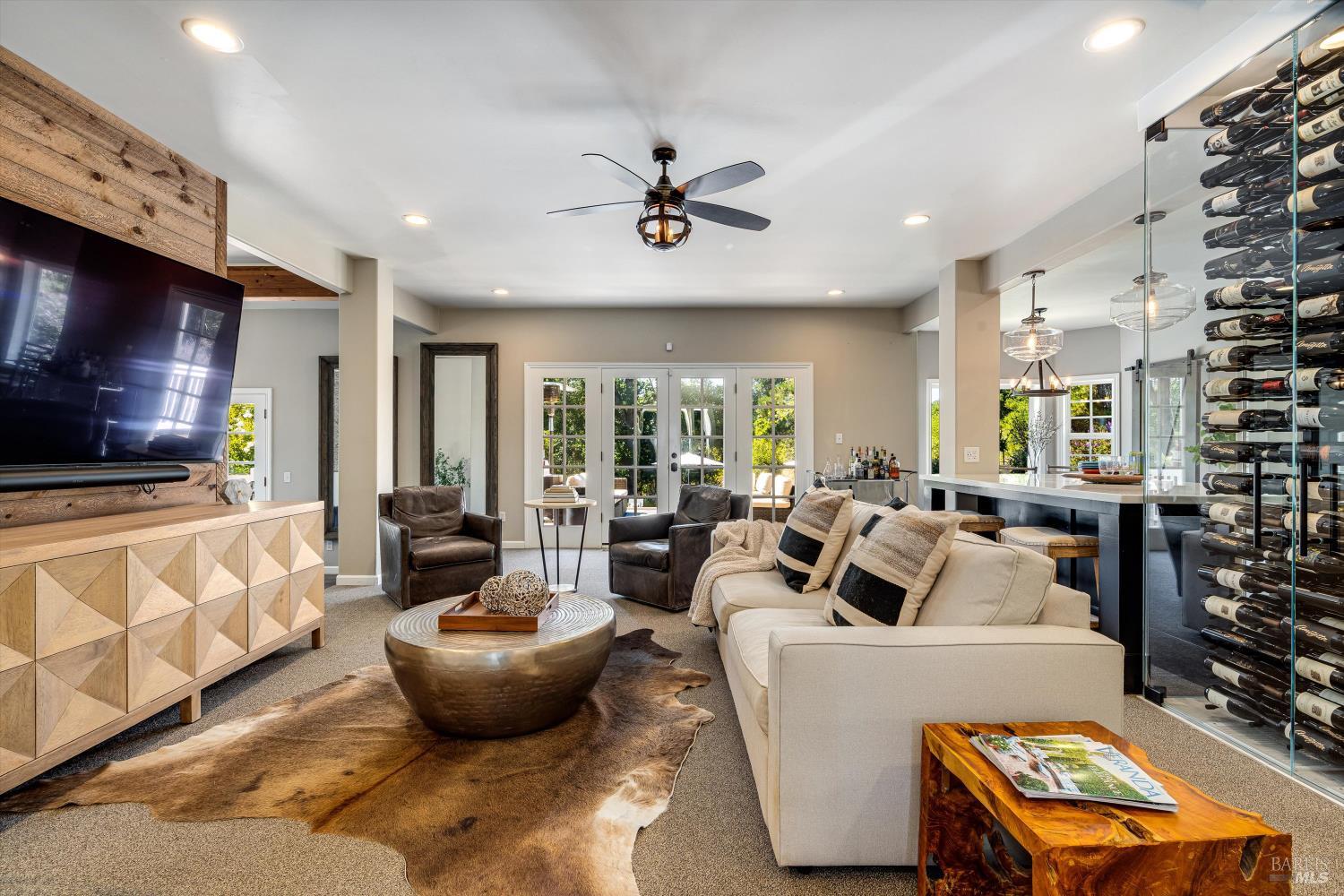 2980 Warm Springs Road Glen Ellen, CA 95442 - Photo 13 of 59 a living room with furniture and a flat screen tv