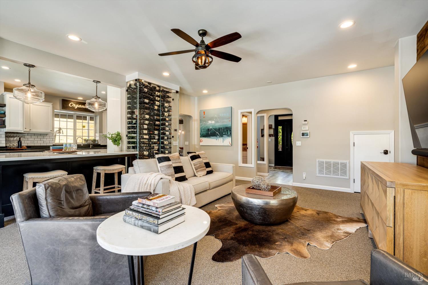 2980 Warm Springs Road Glen Ellen, CA 95442 - Photo 14 of 59 a living room with furniture kitchen view and a chandelier