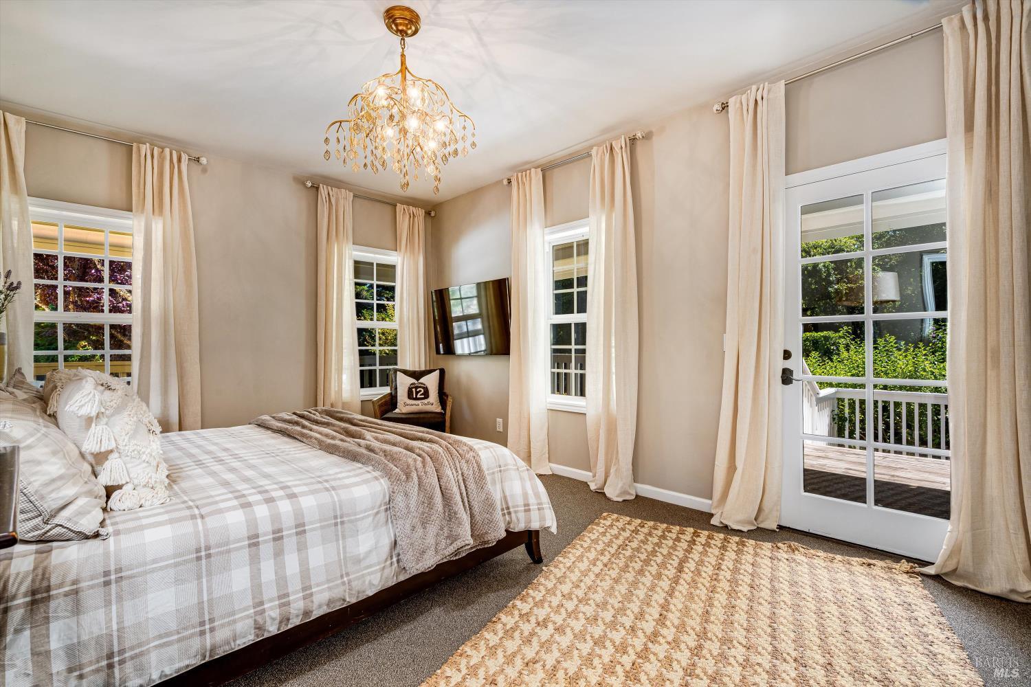 2980 Warm Springs Road Glen Ellen, CA 95442 - Photo 29 of 59 a bedroom with a bed and a window