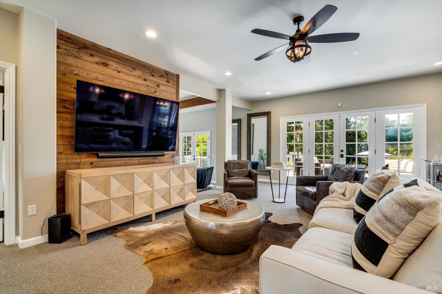 2980 Warm Springs Road Glen Ellen, CA 95442 - Photo 3 of 59 a living room with furniture and a flat screen tv
