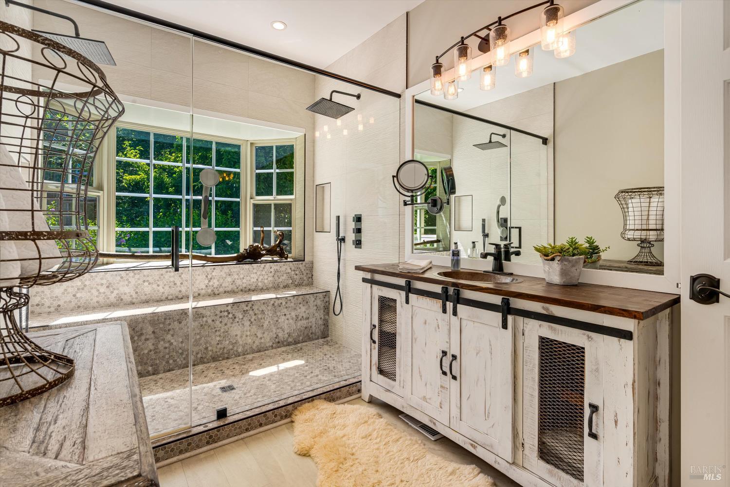 2980 Warm Springs Road Glen Ellen, CA 95442 - Photo 32 of 59 a bathroom with a tub a sink and mirror