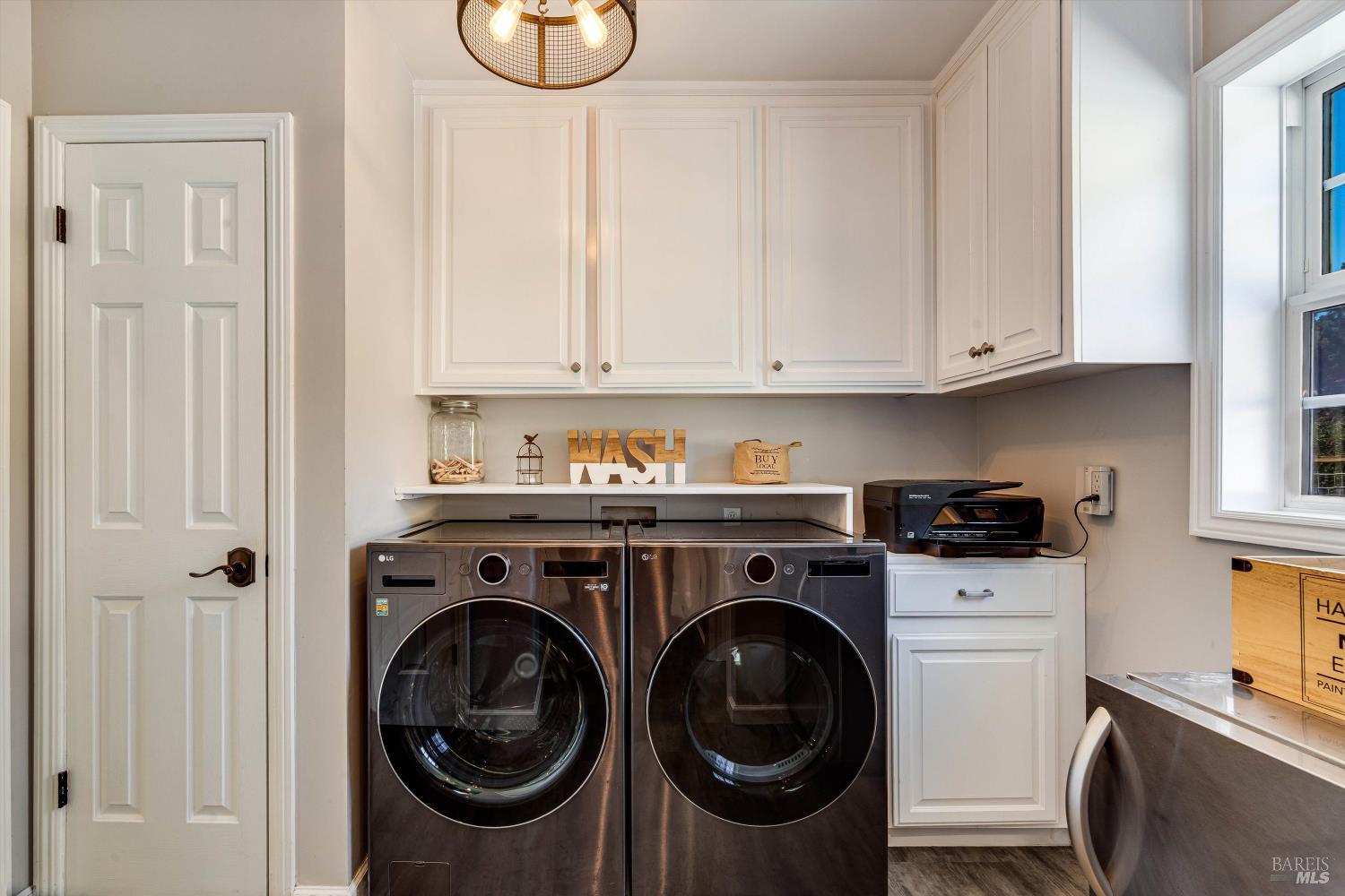 2980 Warm Springs Road Glen Ellen, CA 95442 - Photo 35 of 59 a utility room with sink dryer and washer