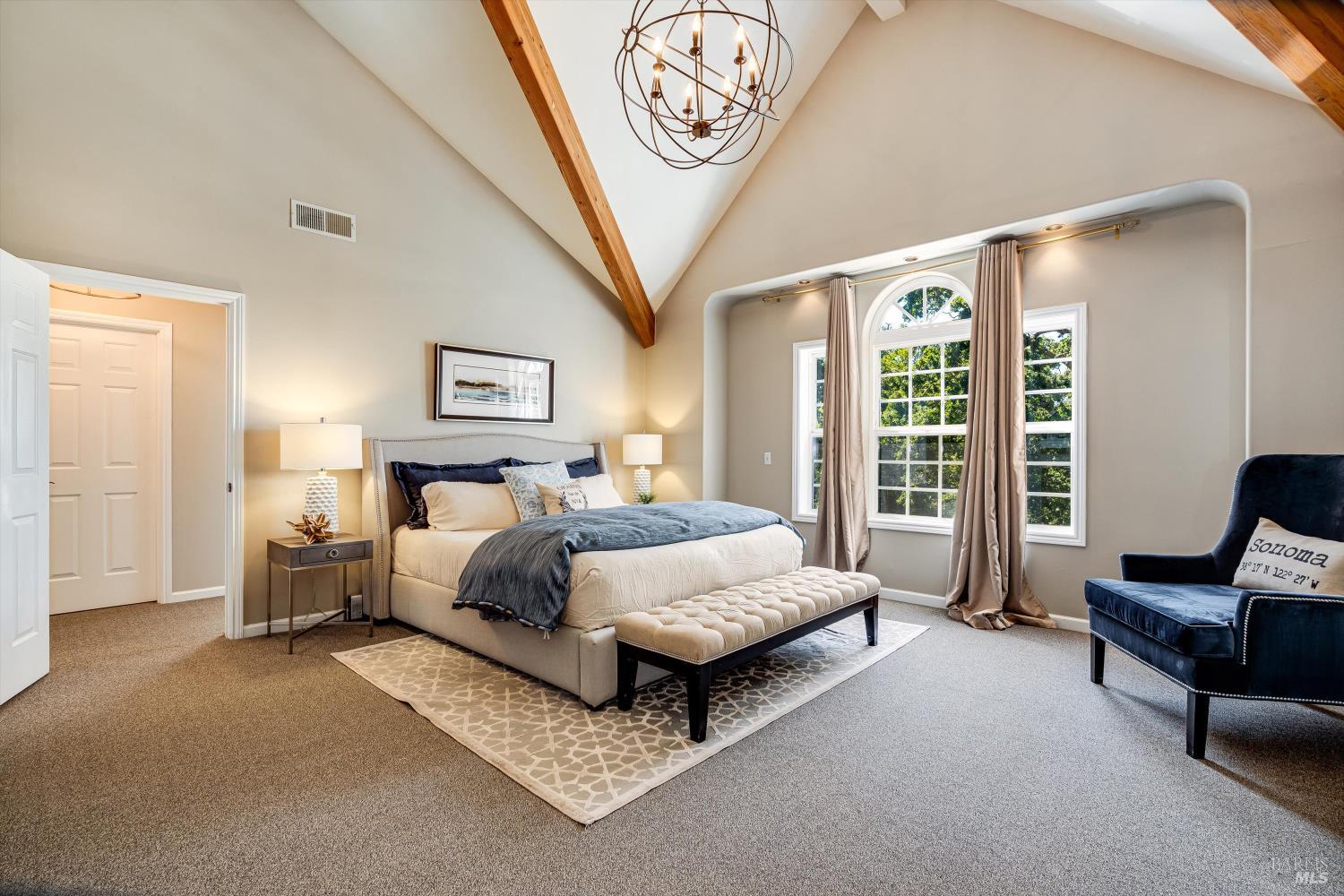 2980 Warm Springs Road Glen Ellen, CA 95442 - Photo 37 of 59 a spacious bedroom with a bed couch and a window