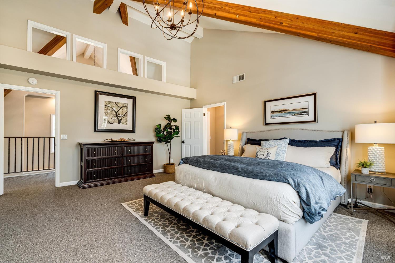 2980 Warm Springs Road Glen Ellen, CA 95442 - Photo 40 of 59 a bedroom with a bed and a lamp on dresser