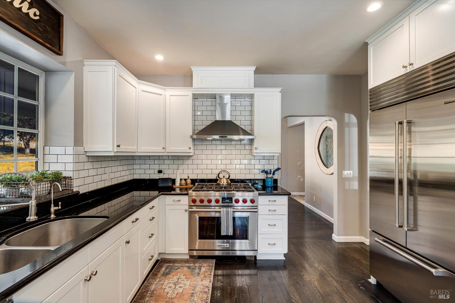 2980 Warm Springs Road Glen Ellen, CA 95442 - Photo 4 of 59 a kitchen with stainless steel appliances granite countertop a stove a sink and a refrigerator