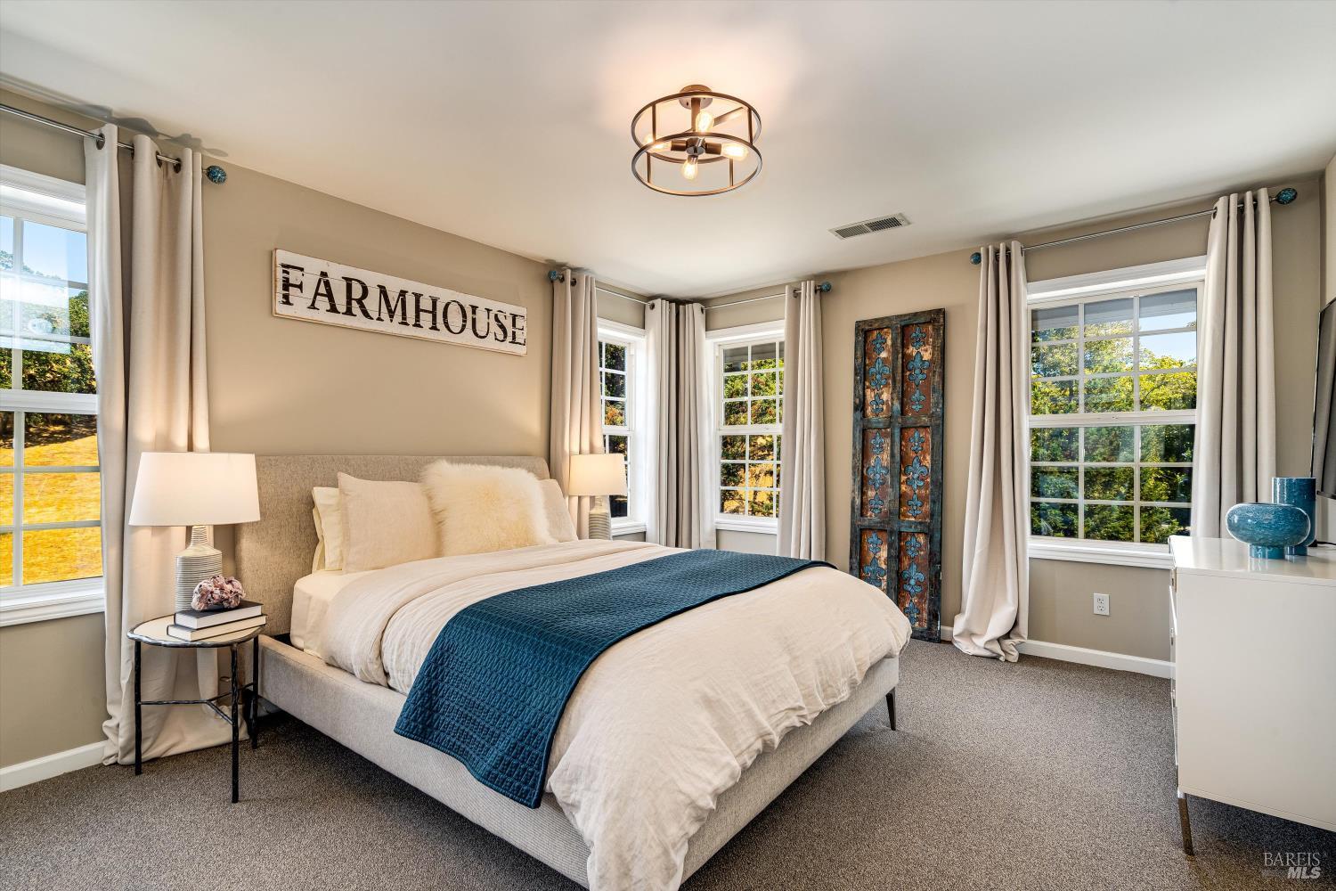 2980 Warm Springs Road Glen Ellen, CA 95442 - Photo 46 of 59 a bedroom with a large bed and a window