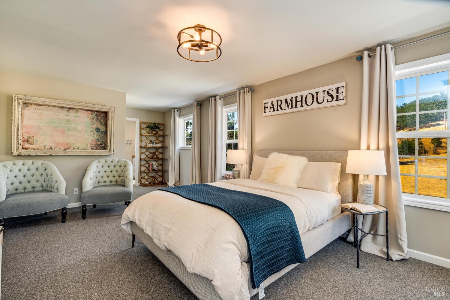 2980 Warm Springs Road Glen Ellen, CA 95442 - Photo 47 of 59 a bedroom with a bed and a couch