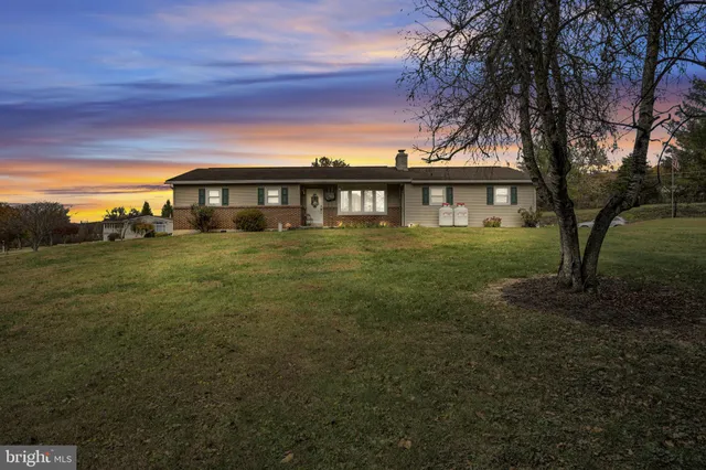 a view of a house with a big yard