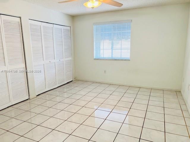3260 West 70th Street, Unit 202 Hialeah, FL 33018 - Photo 11 of 20 an empty room with windows