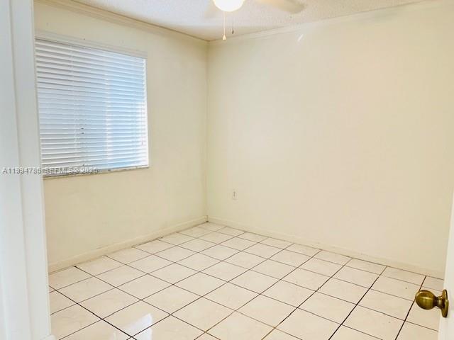 3260 West 70th Street, Unit 202 Hialeah, FL 33018 - Photo 17 of 20 a view of a room that has a window
