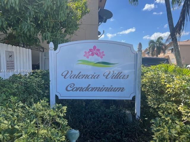 3260 West 70th Street, Unit 202 Hialeah, FL 33018 - Photo 2 of 20 a sign on the side of a building