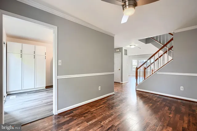 a view of entryway with wooden floor