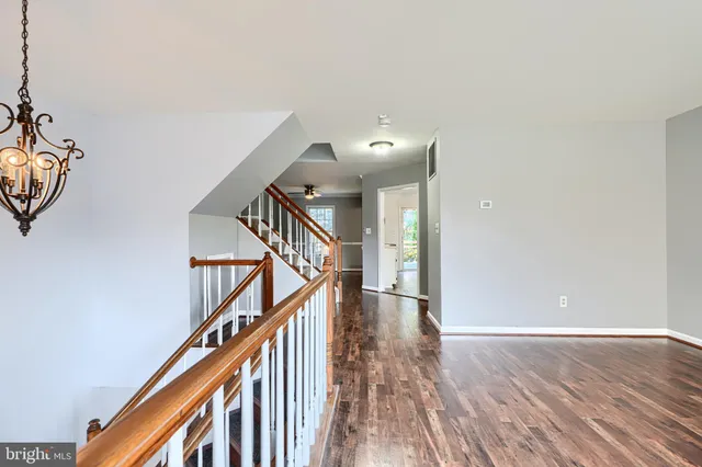 a view of entryway with wooden floor