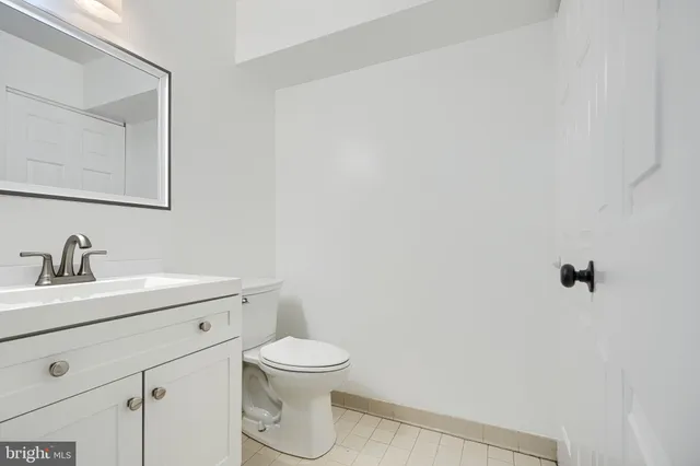 a view of a wooden deck with a yard