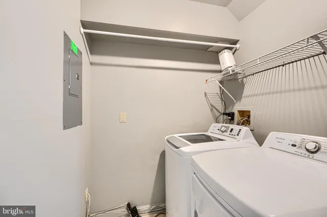 a balcony view with a seating space