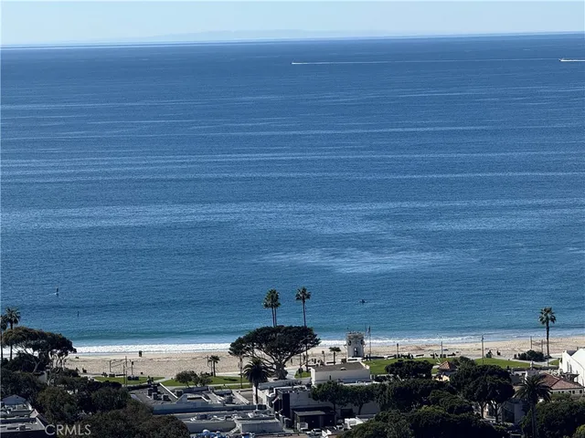 a couple of cars parked in a parking space