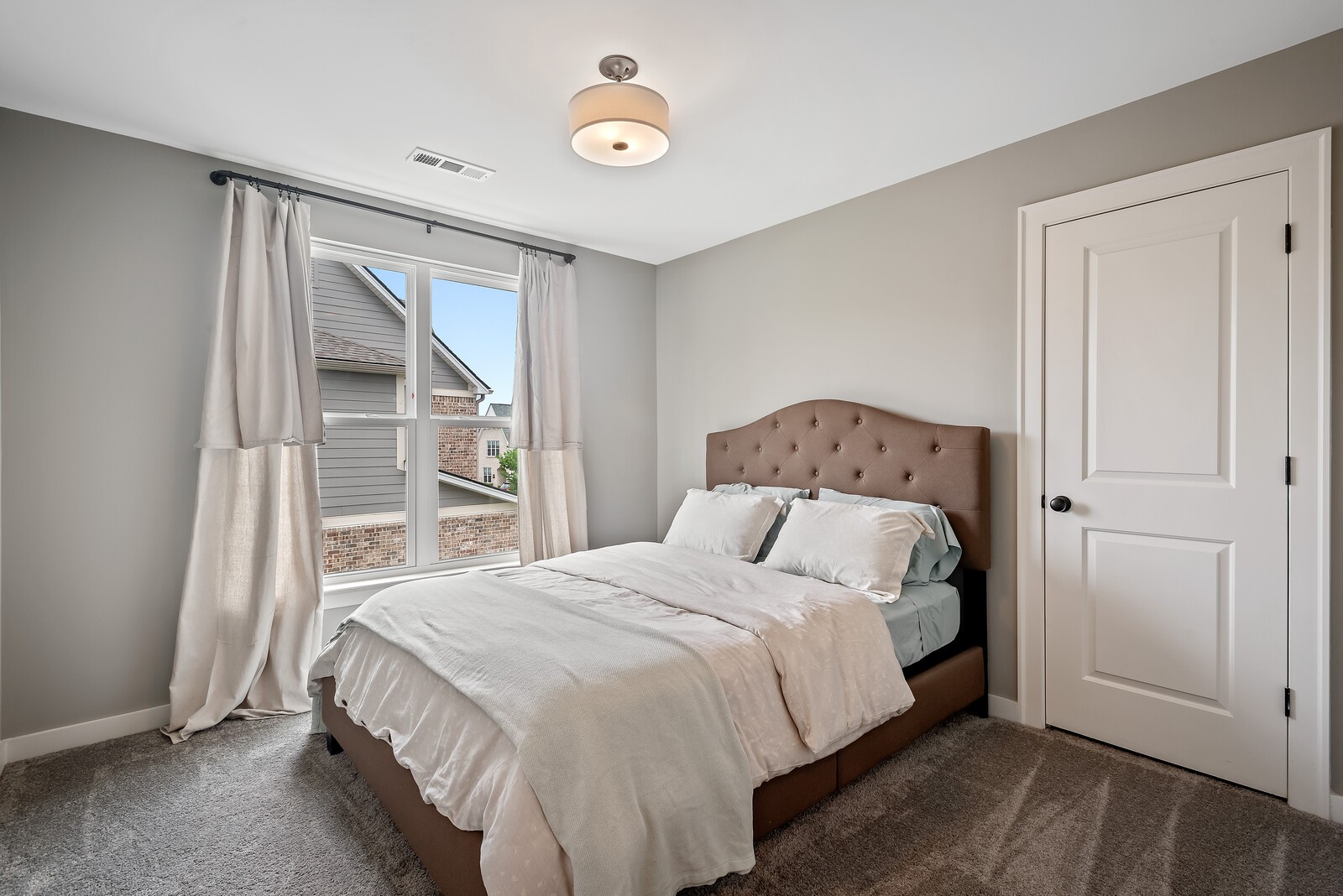 830 Plowson Road Mount Juliet, TN 37122 - Photo 22 of 31 a bedroom with a bed and a window