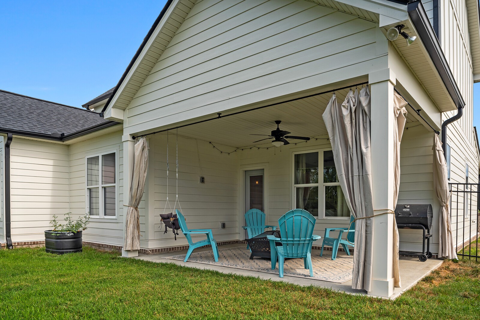 830 Plowson Road Mount Juliet, TN 37122 - Photo 26 of 31 a view of a chair and table in backyard of the house