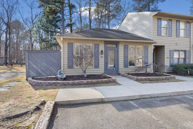 a view of a house with entrance gate