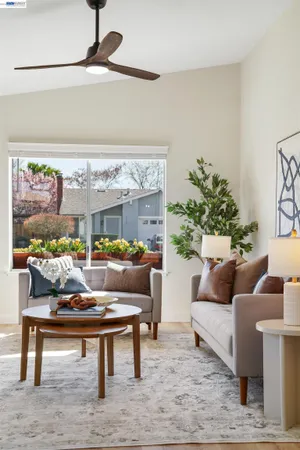a kitchen with stainless steel appliances granite countertop a sink and dishwasher with white cabinets