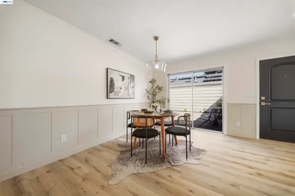 an aerial view of residential building and lake