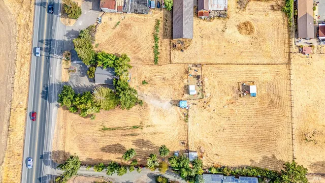 a view of a car park in front of house