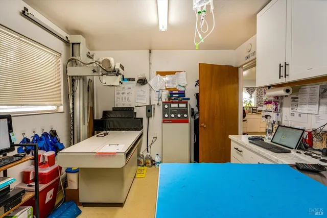 a view of a dining table and chairs in the kitchen