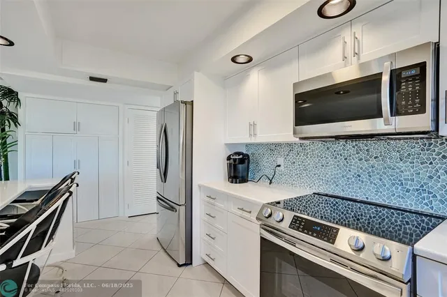 a bedroom with a bed and a view of bathroom