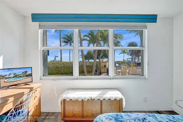 a room with furniture and wooden floor