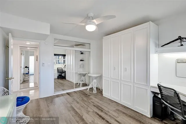 a front view of a residential apartment building with a yard