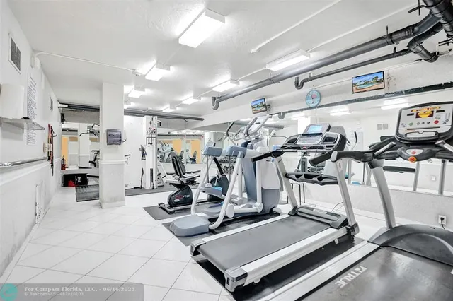 a blue sign that is on the side of a building