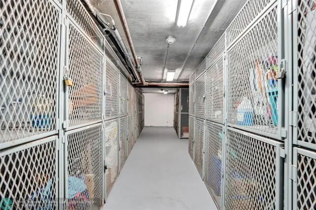 a patio with swimming pool table and chairs