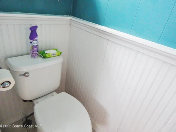 a bathroom with a toilet and sink