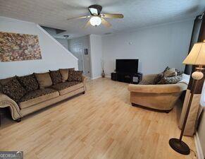 1600 Keystone Drive Conley, GA 30288 - Photo 2 of 12 a living room with furniture and a flat screen tv