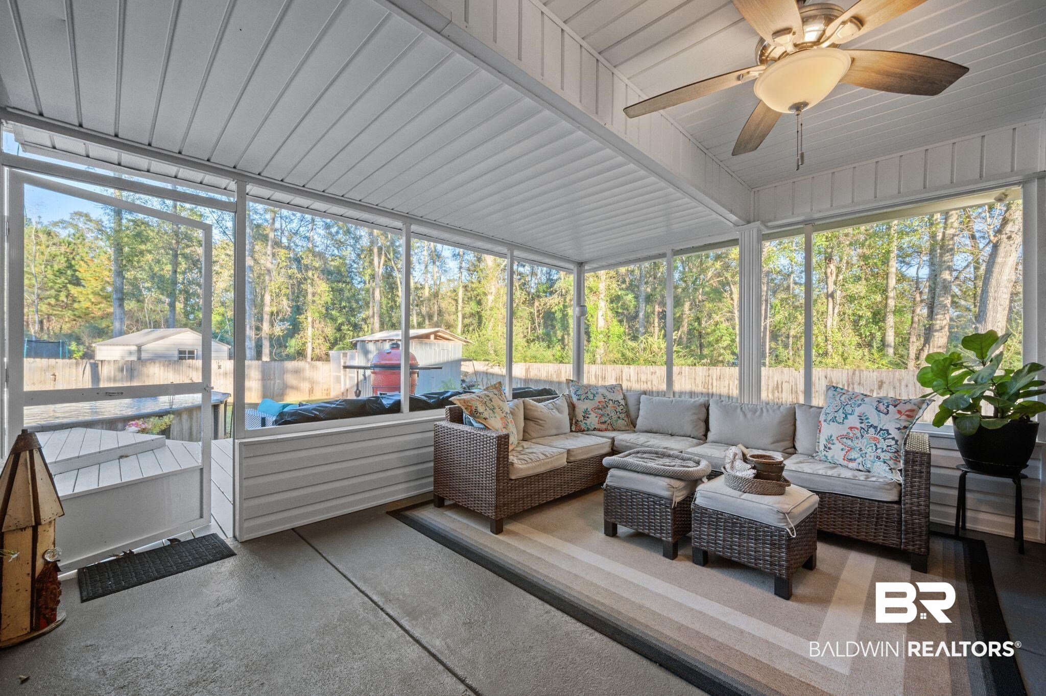9366 Fox Run Court Semmes, AL 36575 - Photo 9 of 29 Sunroom featuring ceiling fan, a healthy amount of sunlight, and wood ceiling