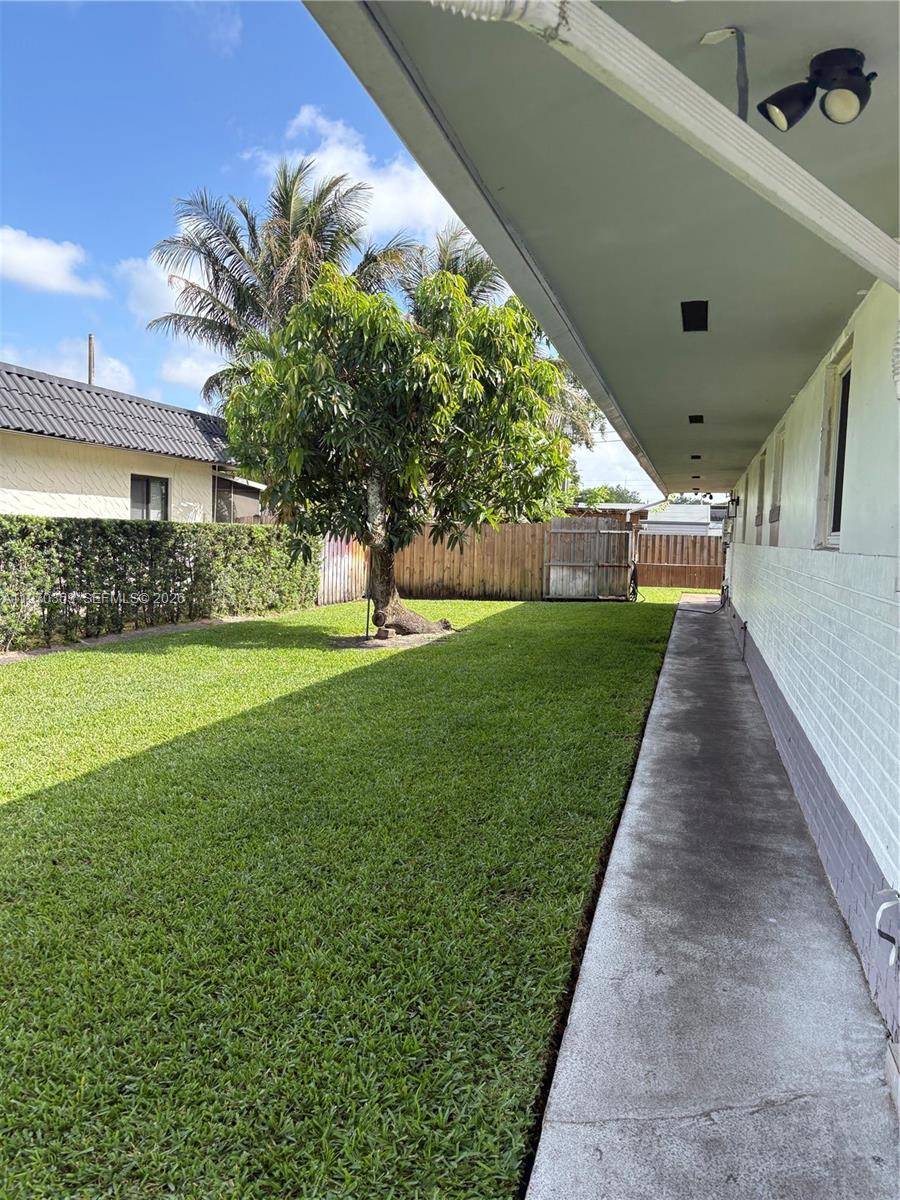 5632 Hayes Street Hollywood, FL 33021 - Photo 28 of 42 a view of a house with a yard