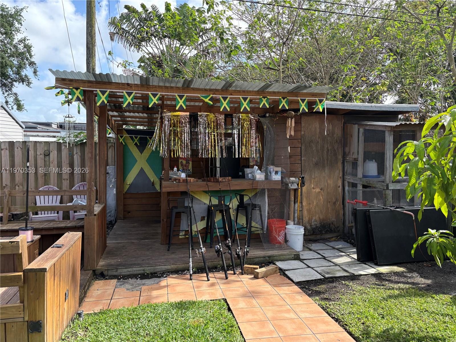 5632 Hayes Street Hollywood, FL 33021 - Photo 33 of 42 a view of outdoor space and porch