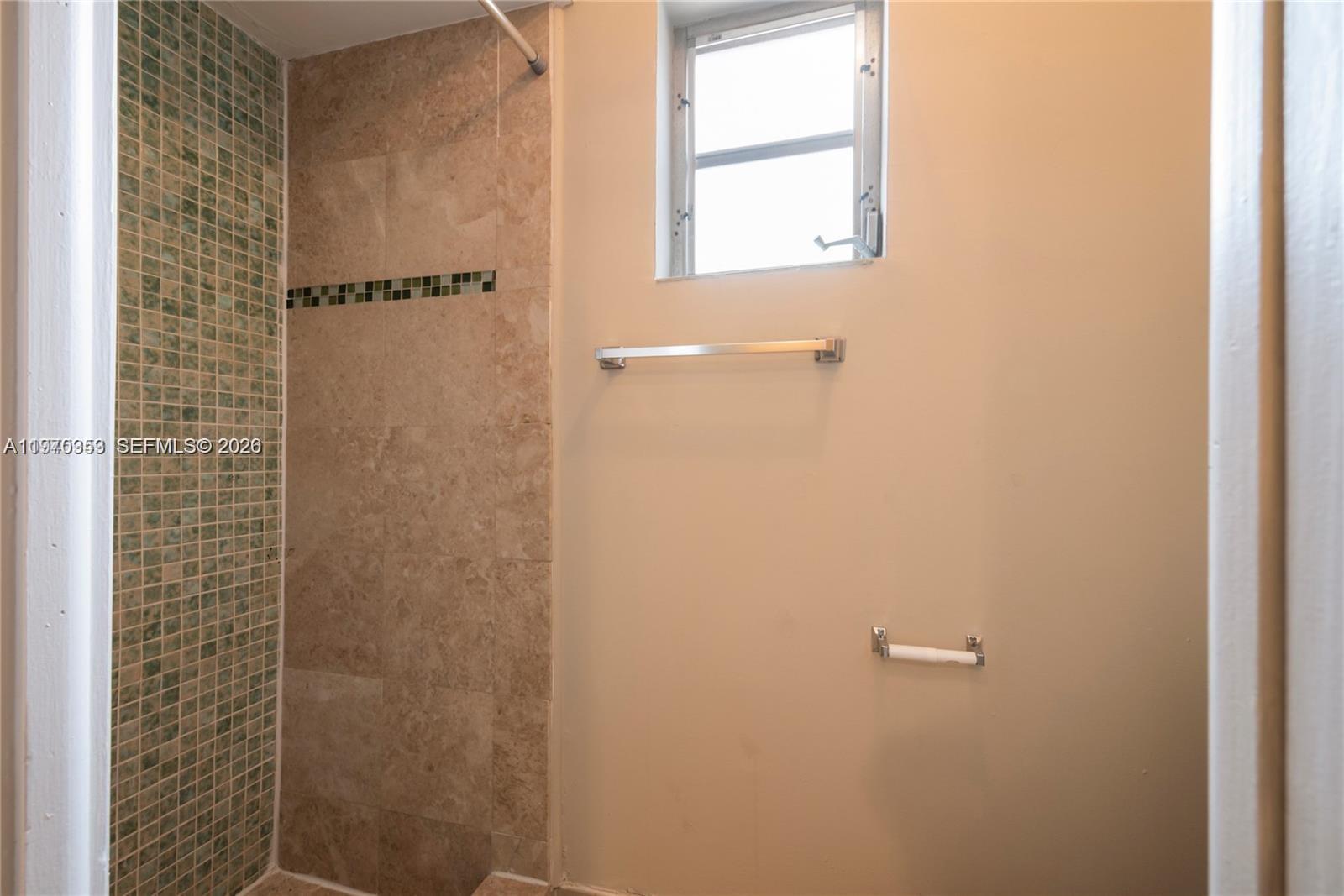 5632 Hayes Street Hollywood, FL 33021 - Photo 8 of 42 a bathroom with a shower