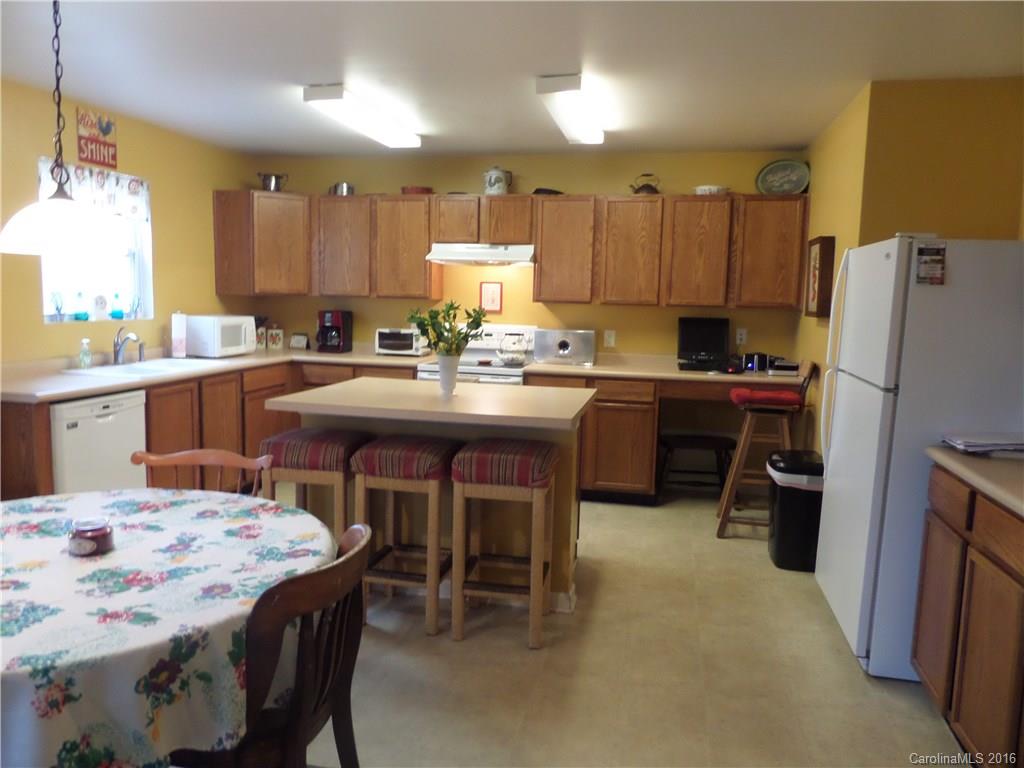 2030 Durand Road, Unit 7 Fort Mill, SC 29715 - Photo 2 of 21 a kitchen that has a table and chairs in it