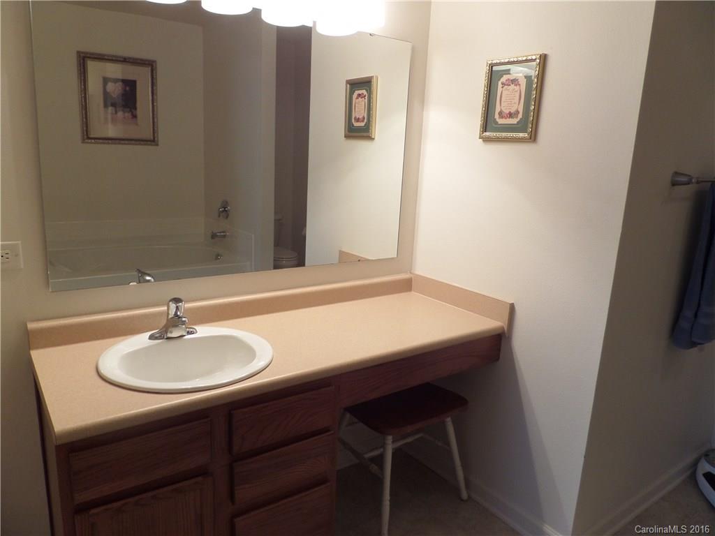 2030 Durand Road, Unit 7 Fort Mill, SC 29715 - Photo 12 of 21 a bathroom with a sink and a mirror