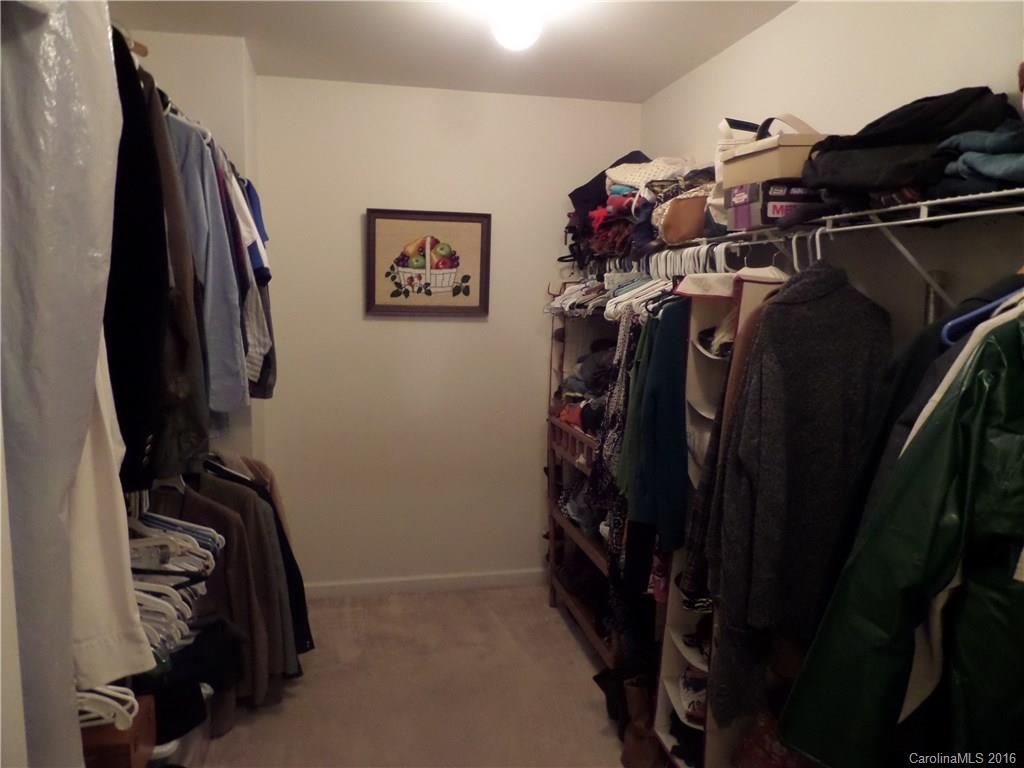 2030 Durand Road, Unit 7 Fort Mill, SC 29715 - Photo 13 of 21 a view of walk in closet with clothes and shoes