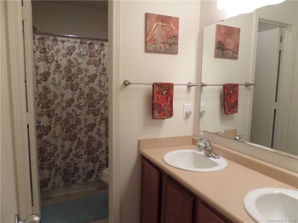 2030 Durand Road, Unit 7 Fort Mill, SC 29715 - Photo 15 of 21 a bathroom with a sink and a mirror