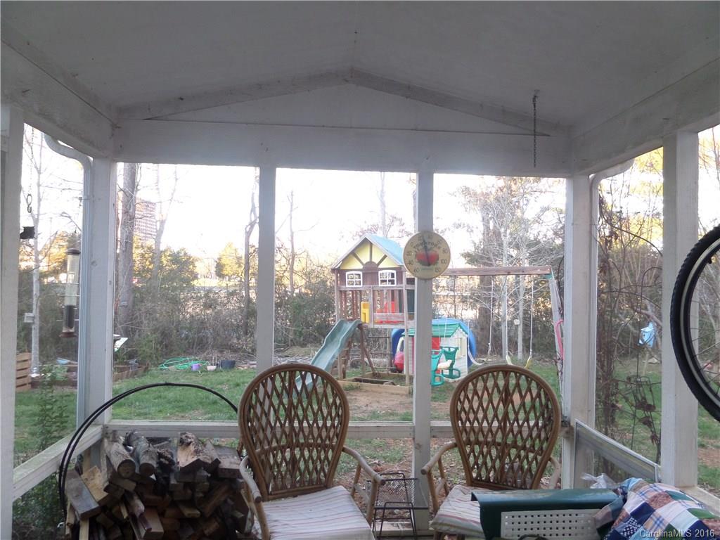 2030 Durand Road, Unit 7 Fort Mill, SC 29715 - Photo 20 of 21 a view of a porch with furniture and backyard