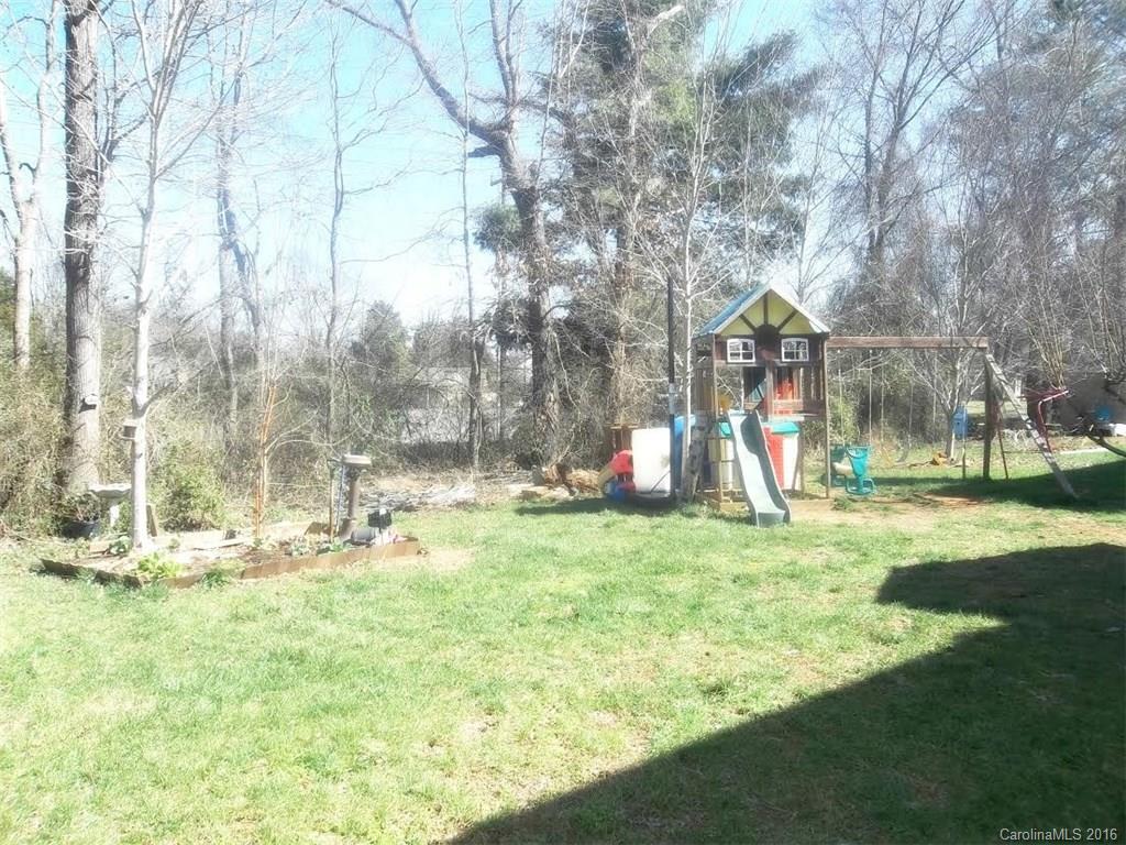 2030 Durand Road, Unit 7 Fort Mill, SC 29715 - Photo 21 of 21 a view of a garden with a slide