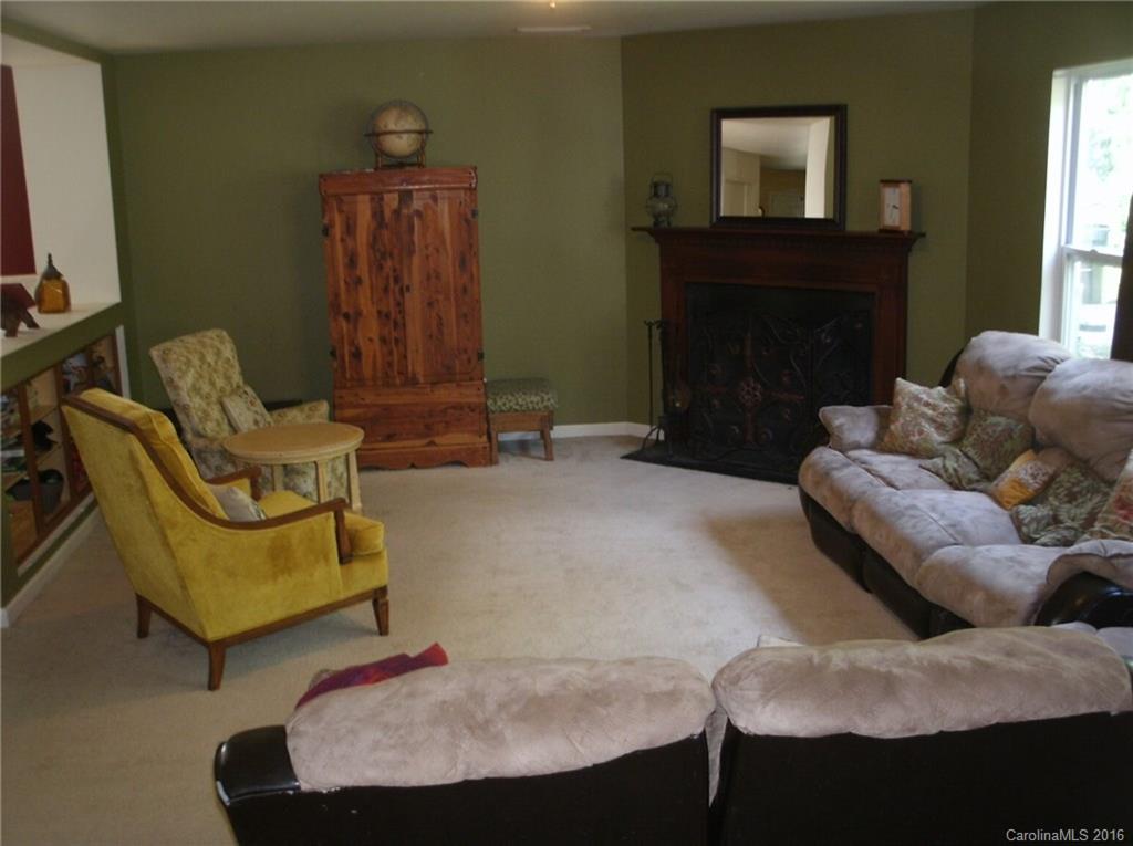 2030 Durand Road, Unit 7 Fort Mill, SC 29715 - Photo 4 of 21 a living room with furniture and a fireplace