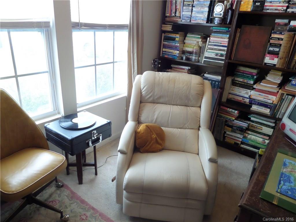 2030 Durand Road, Unit 7 Fort Mill, SC 29715 - Photo 6 of 21 a bedroom with a bed a couch and a window