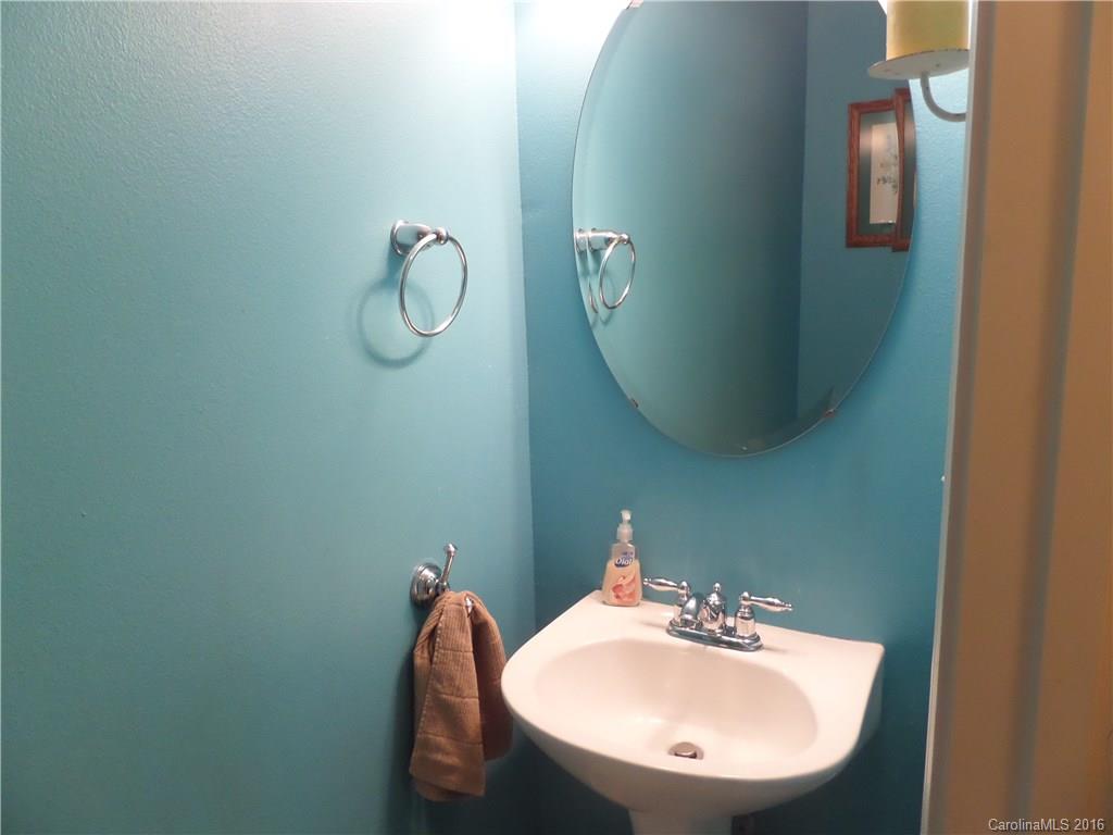 2030 Durand Road, Unit 7 Fort Mill, SC 29715 - Photo 7 of 21 a bathroom with a sink and mirror