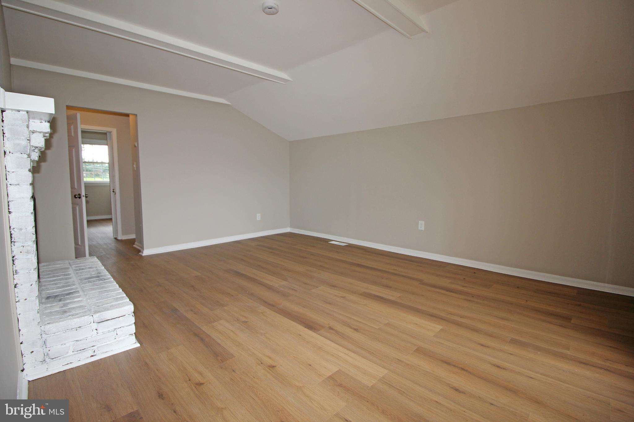 27 West Kennedy Drive Clementon, NJ 08021 - Photo 16 of 39 wooden floor in an empty room