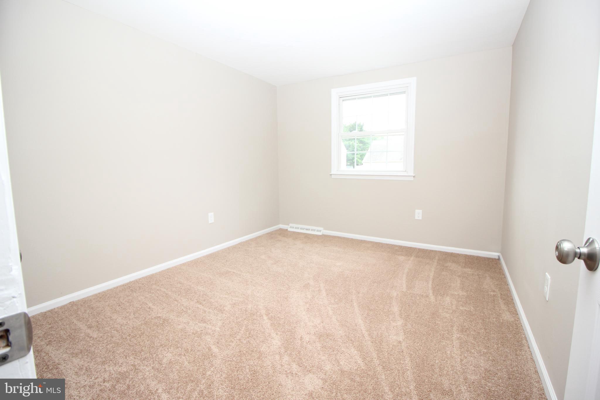 27 West Kennedy Drive Clementon, NJ 08021 - Photo 29 of 39 an empty room with a window